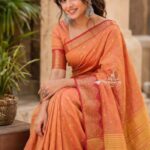 Elite Raw silk Sarees with Temple tower Design