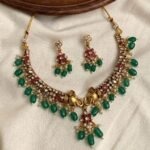 Gaja Lakshmi Dual Airavat Stiff Wing Pearl Beaded Choker With Earring